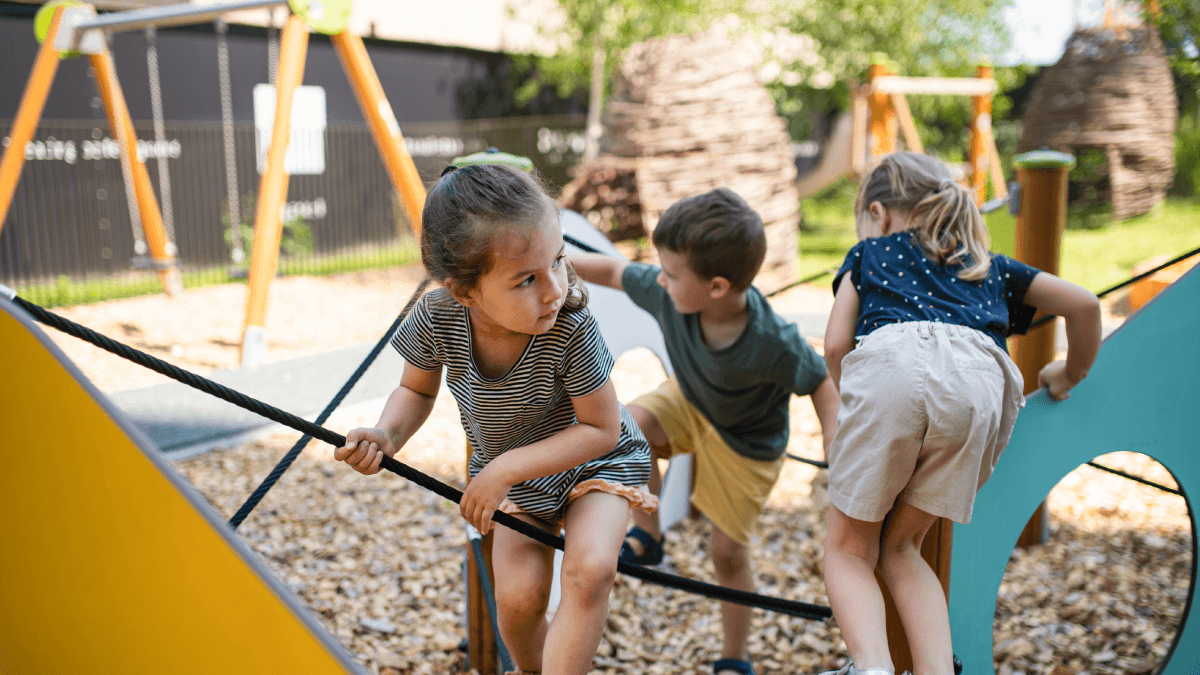 children playing in nursery garden